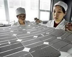 Merkel, Li urge dialogue to defuse EU-China trade spats